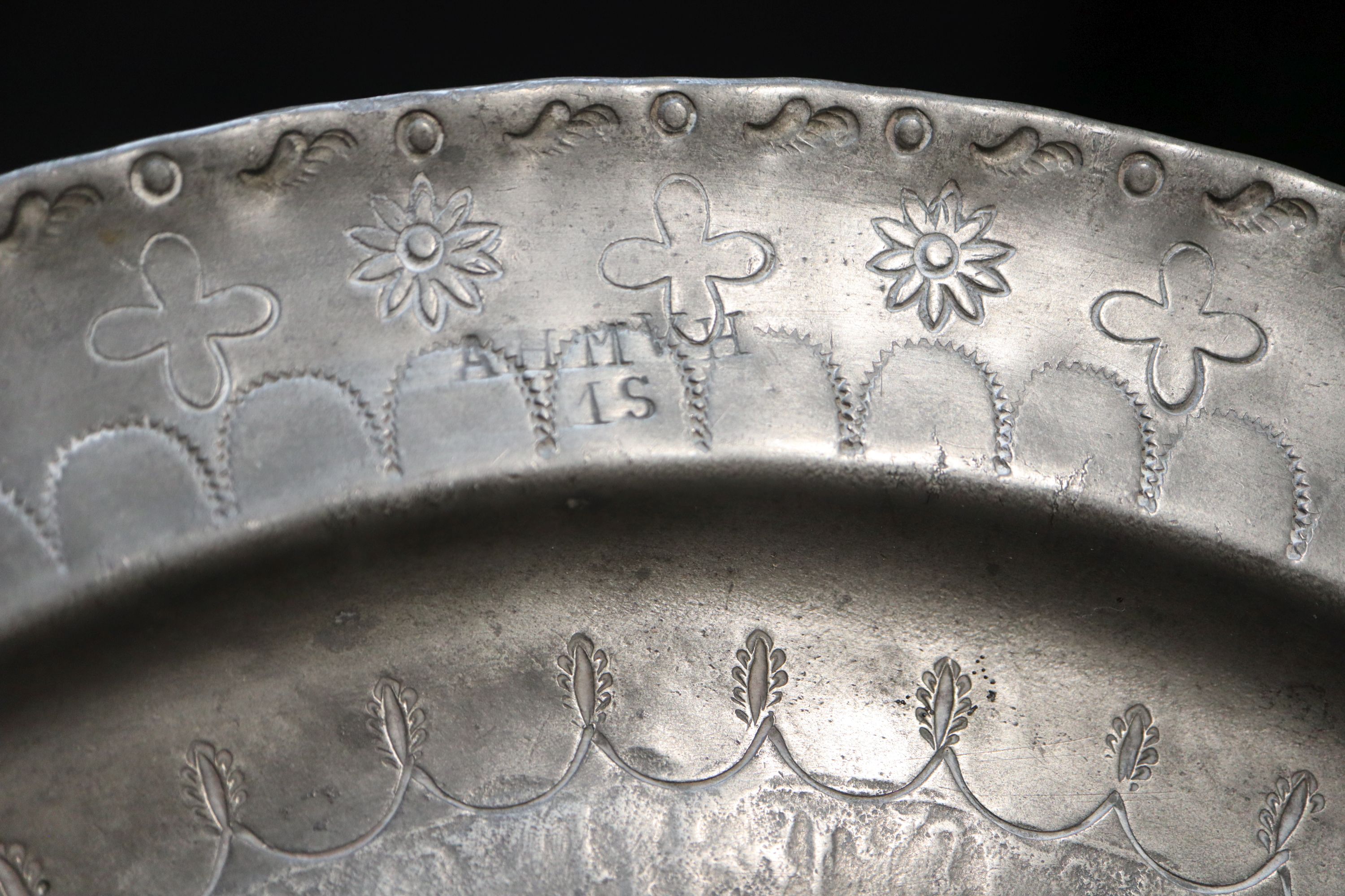 Two century style Continental pewter dishes,